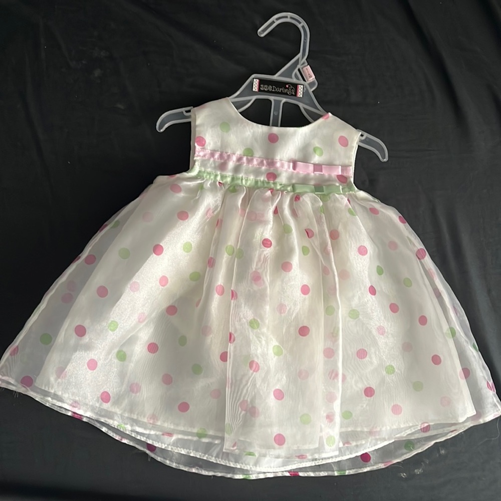 Never worn 2 Piece dress 100% polyester. Exclusive of trim